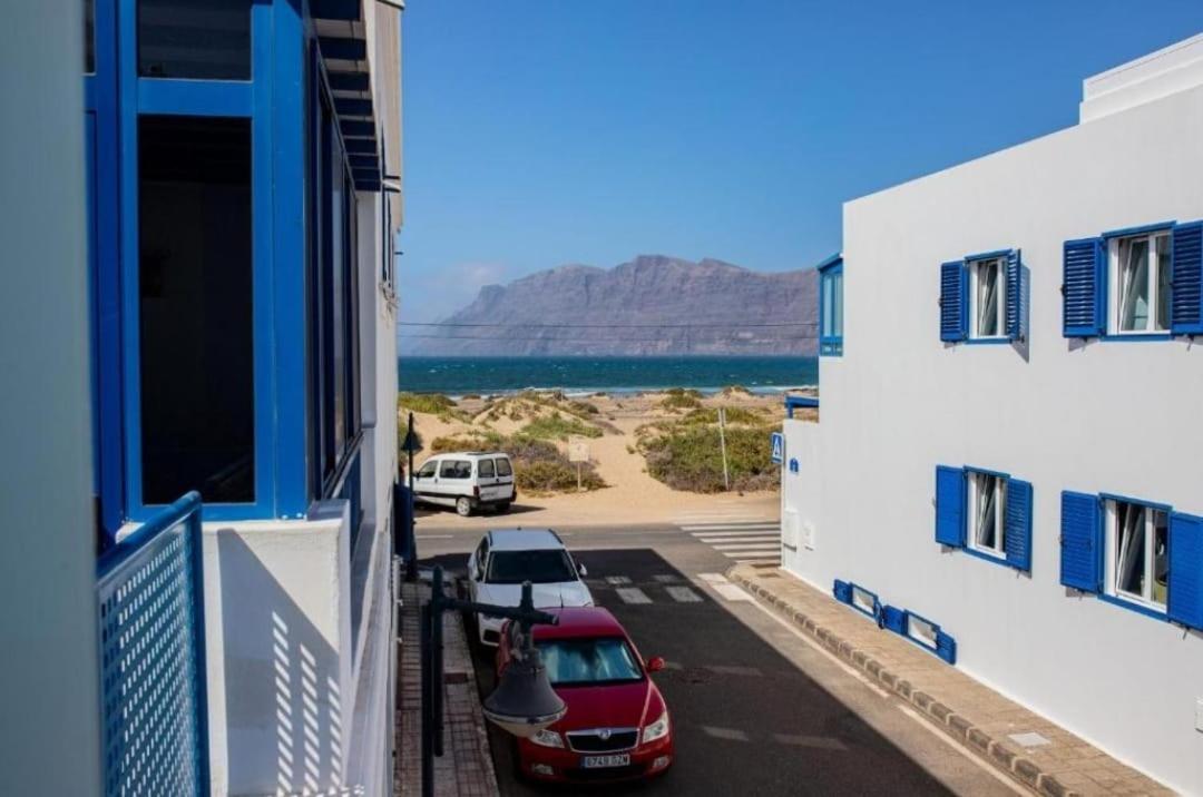 Salón con aire acondicionado y TV plana